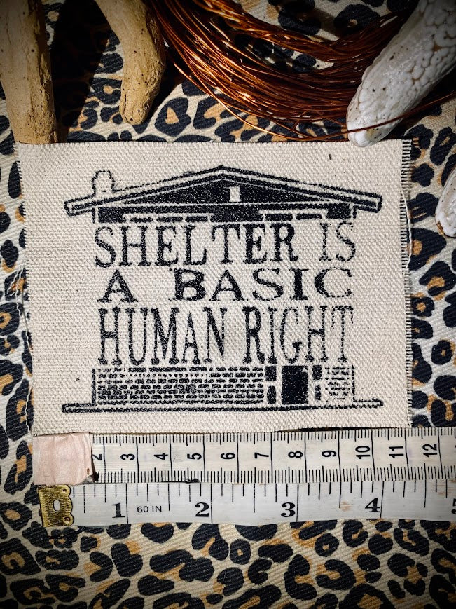 Shelter is a basic human right. sew on patch.