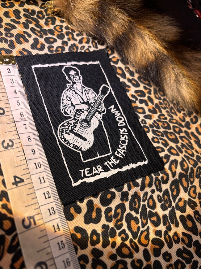 Woody Guthrie patch.