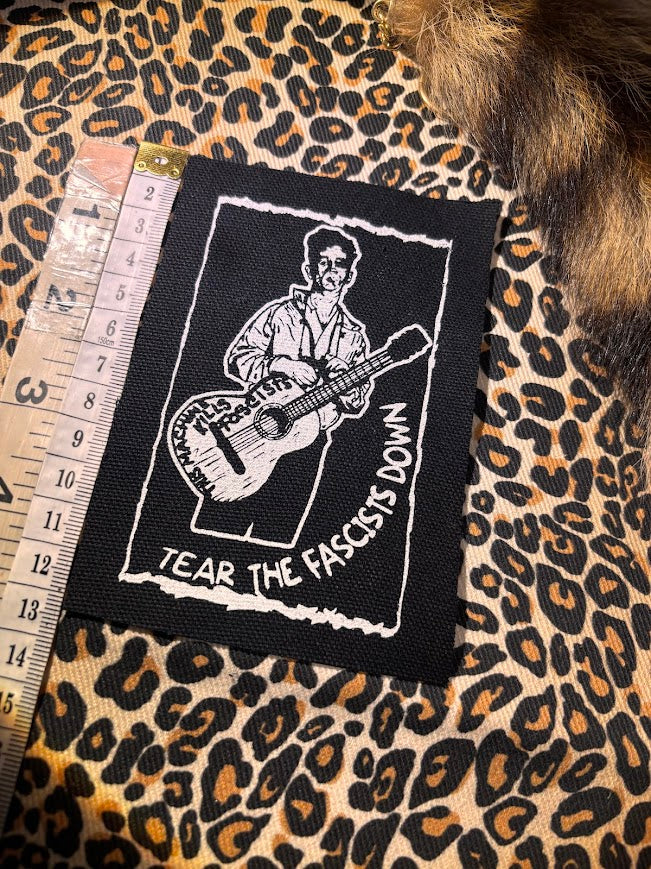 Woody Guthrie patch.