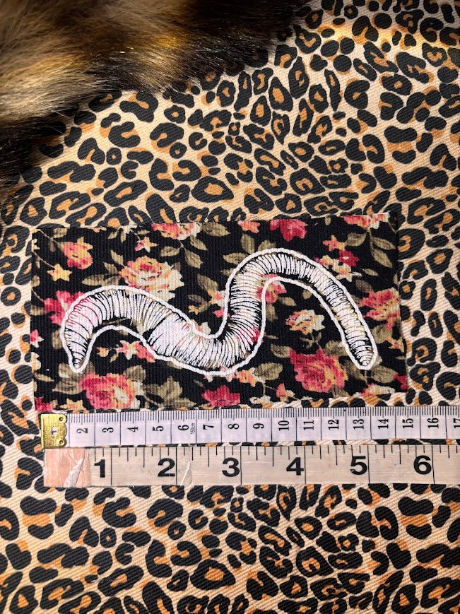 Worm sew on patch