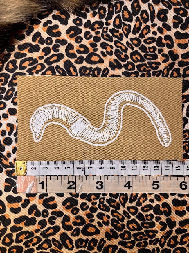 Worm sew on patch