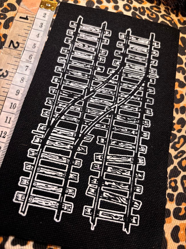 Two train tracks sew on patch