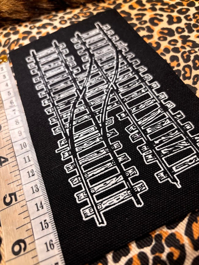 Two train tracks sew on patch