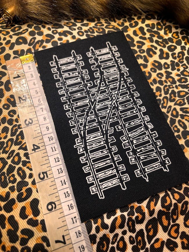 Two train tracks sew on patch