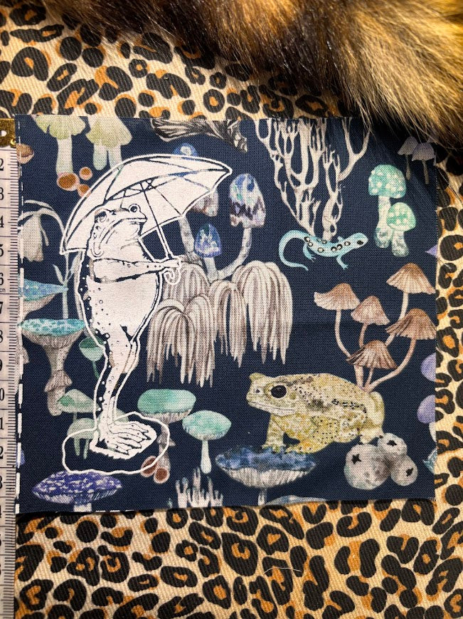 Sad frog holding an umbrella in the rain sew on patch