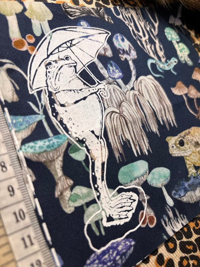 Sad frog holding an umbrella in the rain sew on patch