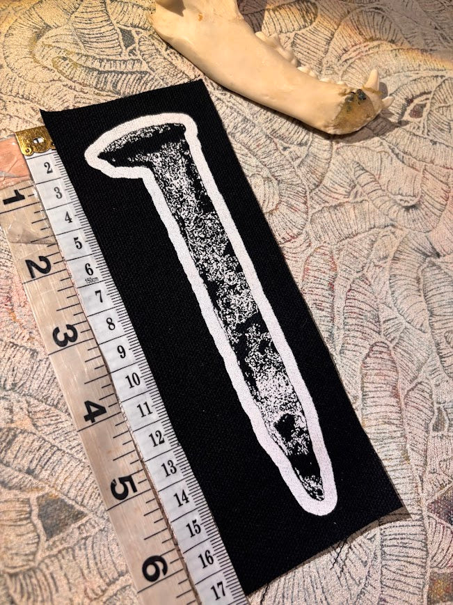 Life size rail spike patch.