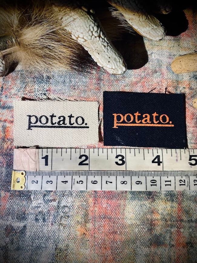 Potato patch. just a tiny patch that says potato.