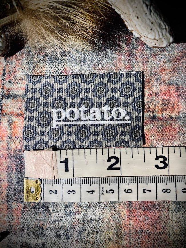 Potato patch. just a tiny patch that says potato.