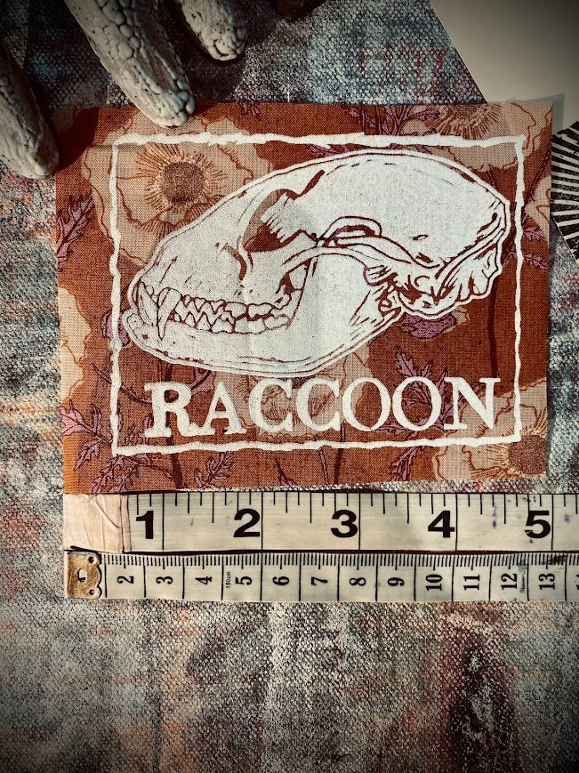 Raccoon skull sew on patch