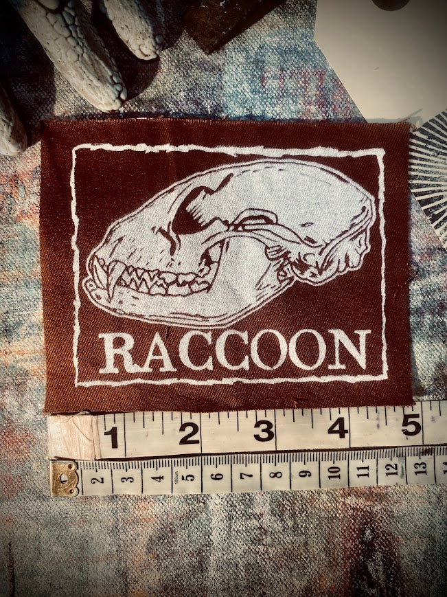 Raccoon skull sew on patch