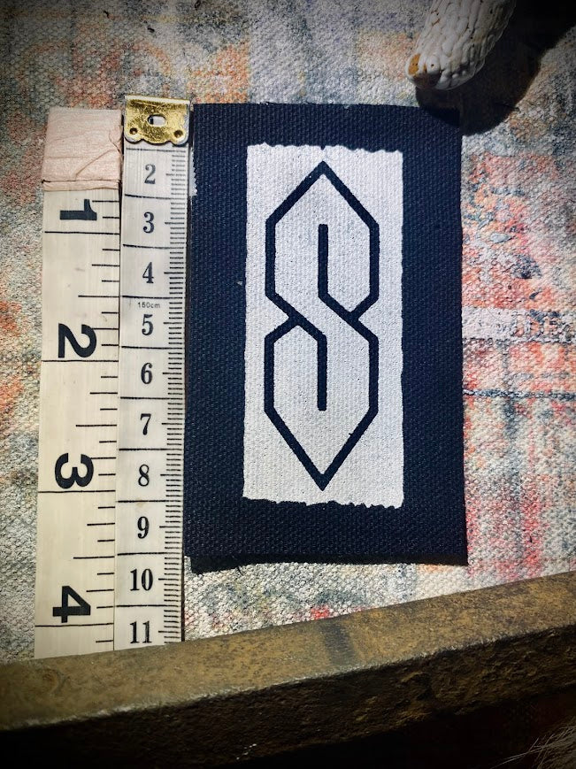 The cool S. that greasy 90's binder S thing sew on patch.