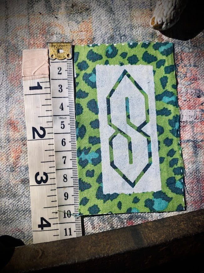 The cool S. that greasy 90's binder S thing sew on patch.