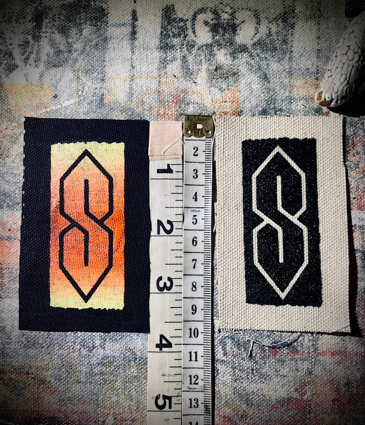 The cool S. that greasy 90's binder S thing sew on patch.