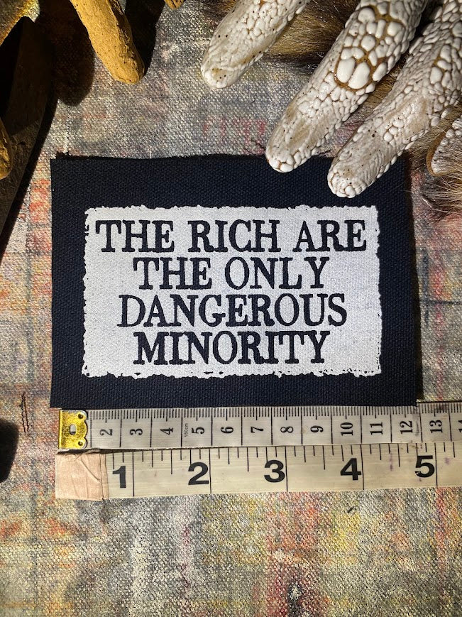 The rich are the only dangerous minority sew on patch.