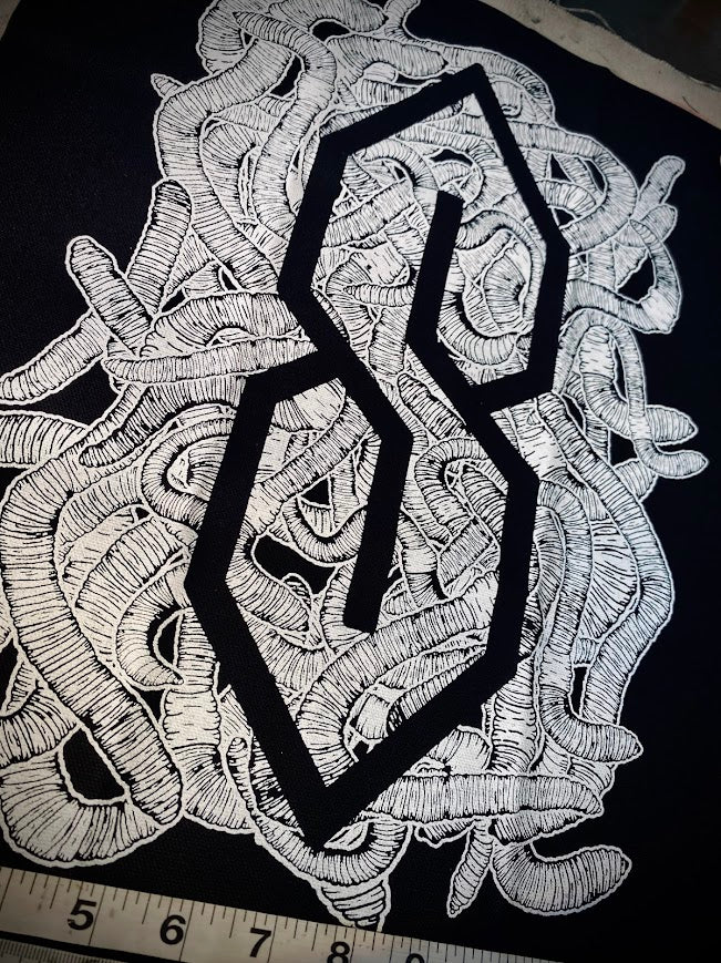 The cool S covered in worms back patch