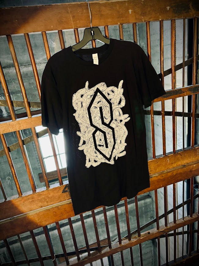 The Cool S in a pile of worms t-shirt