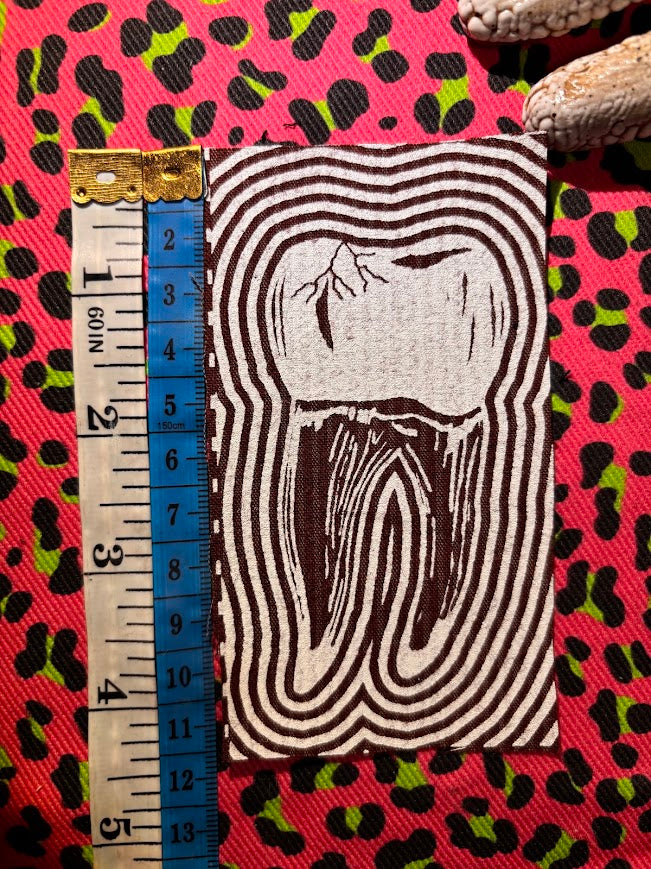 Tooth with a toothache patch