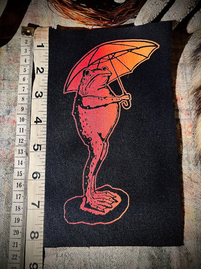 Sad frog holding an umbrella in the rain sew on patch.