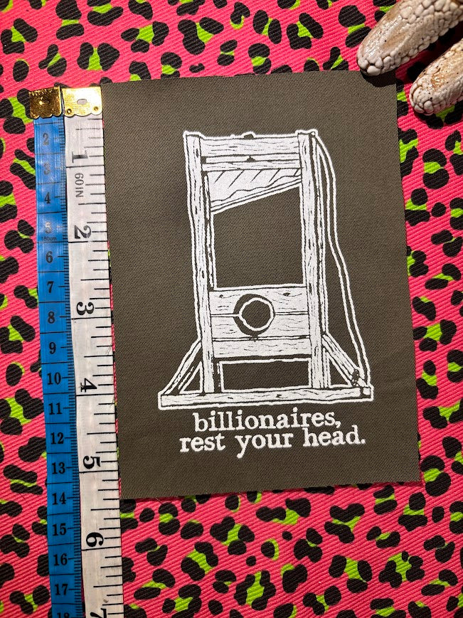 Guillotine sew on patch. Billionaires, rest your head