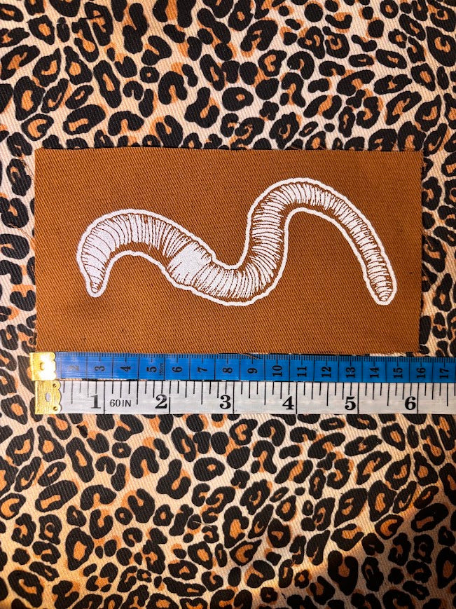 Worm sew on patch