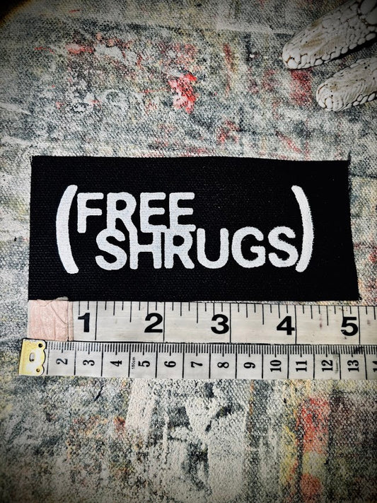 Free Shrugs sew on patch. never mind free hugs, you get free shrugs.