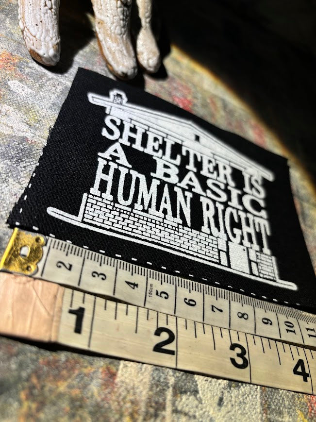 Shelter is a basic human right. sew on patch.