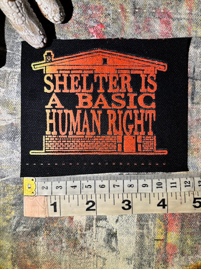 Shelter is a basic human right. sew on patch.