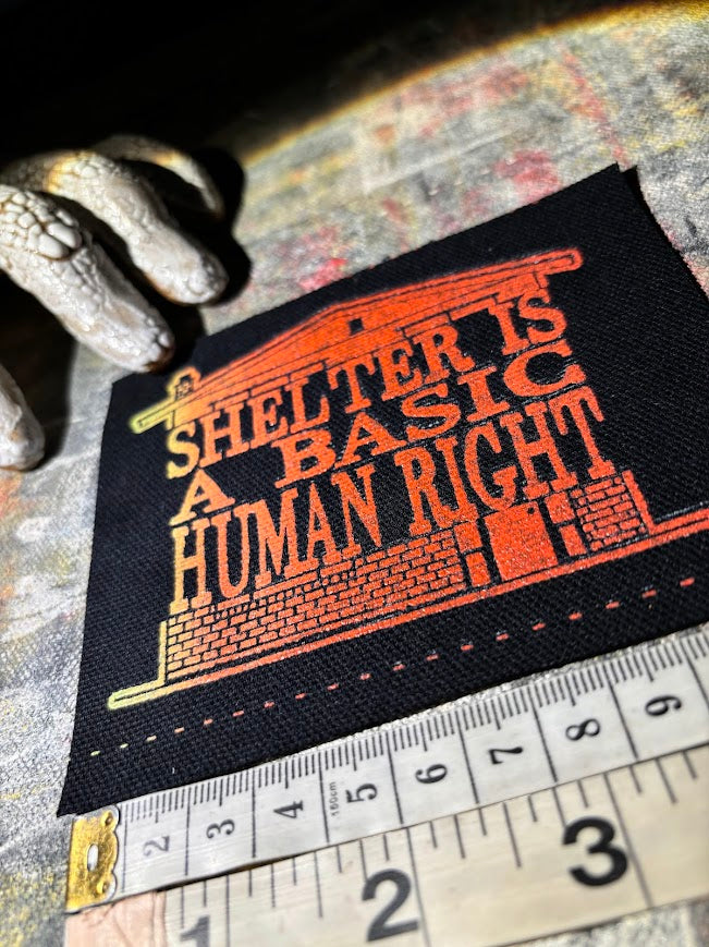 Shelter is a basic human right. sew on patch.