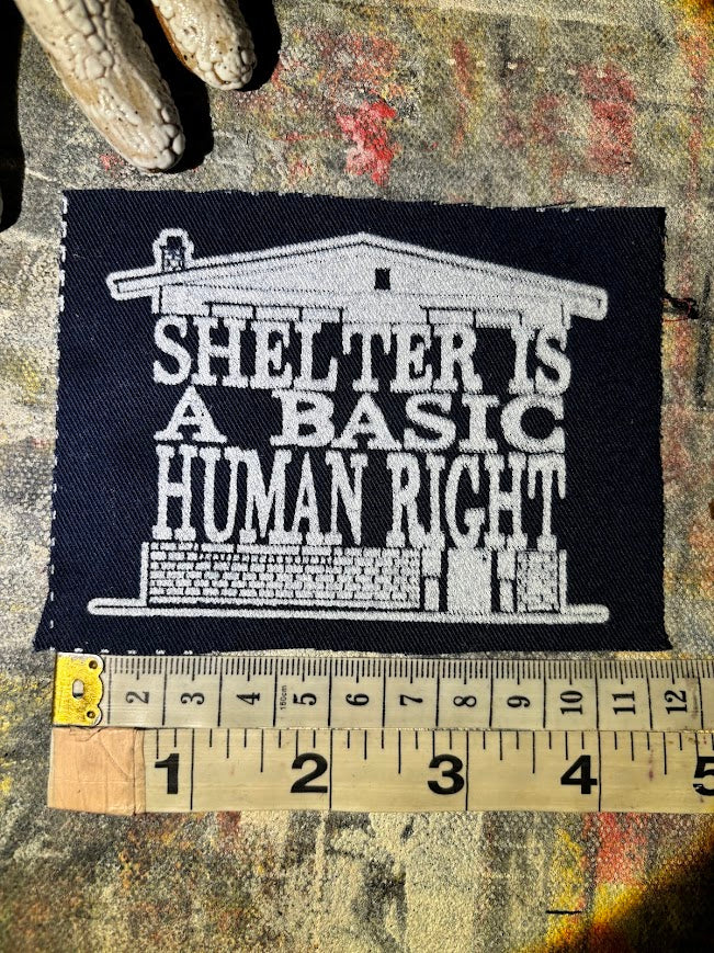 Shelter is a basic human right. sew on patch.