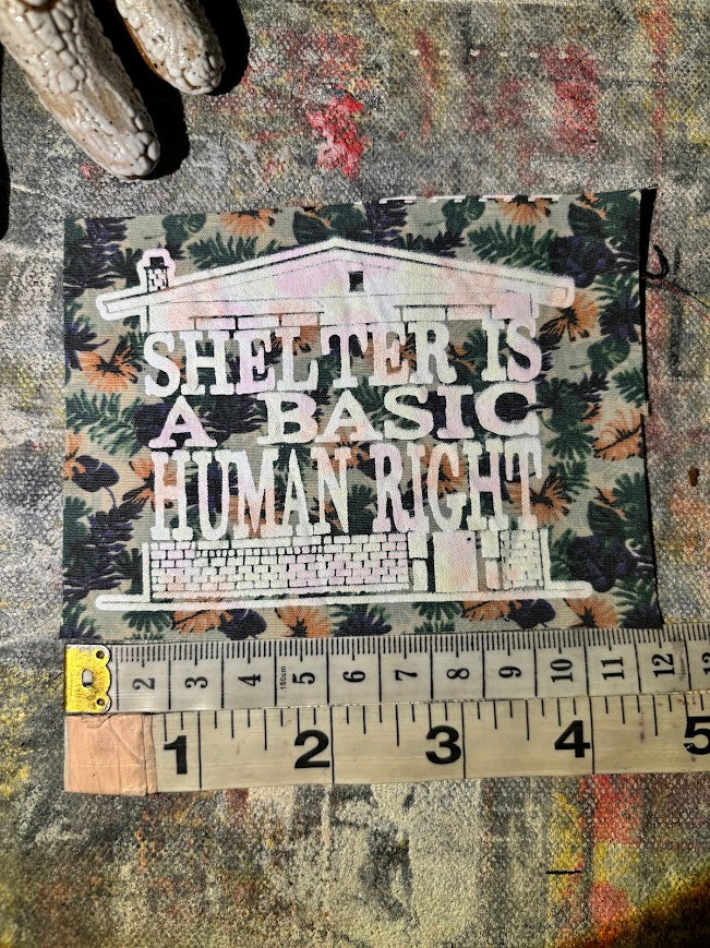 Shelter is a basic human right. sew on patch.