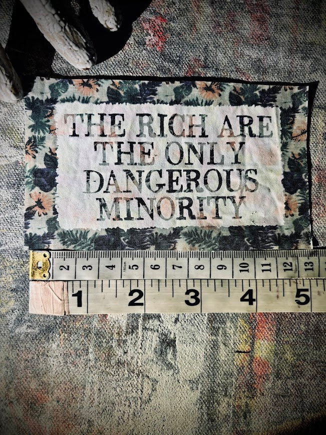 The rich are the only dangerous minority sew on patch.