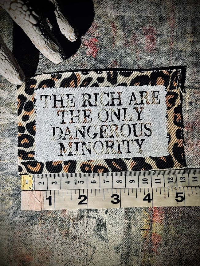 The rich are the only dangerous minority sew on patch.