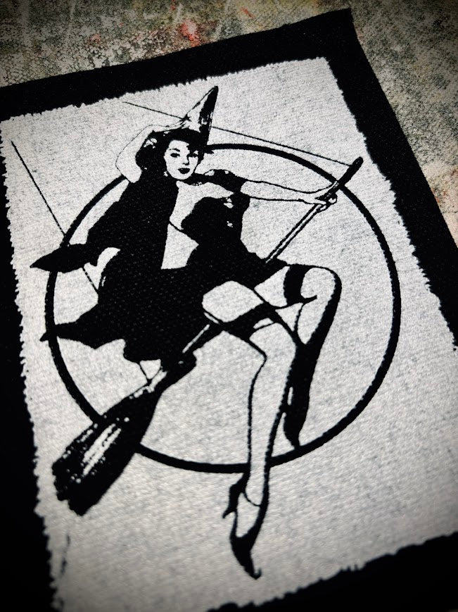 Witch pinup riding a broom sew on patch